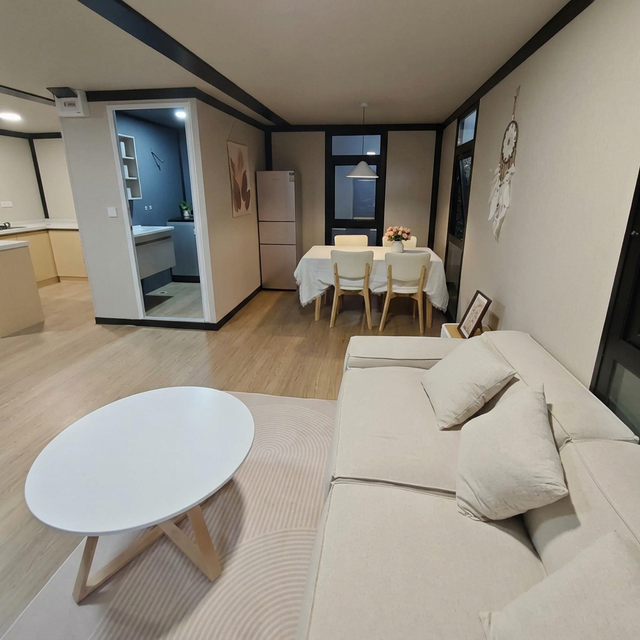 Spacious cabin living and dining area with modern furnishings